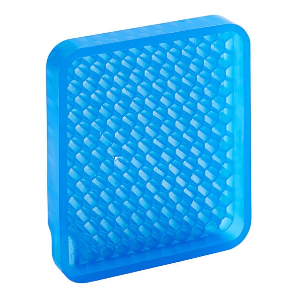 A blue plastic square with a hexagon pattern on the surface.