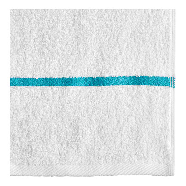 A white towel with a blue stripe.