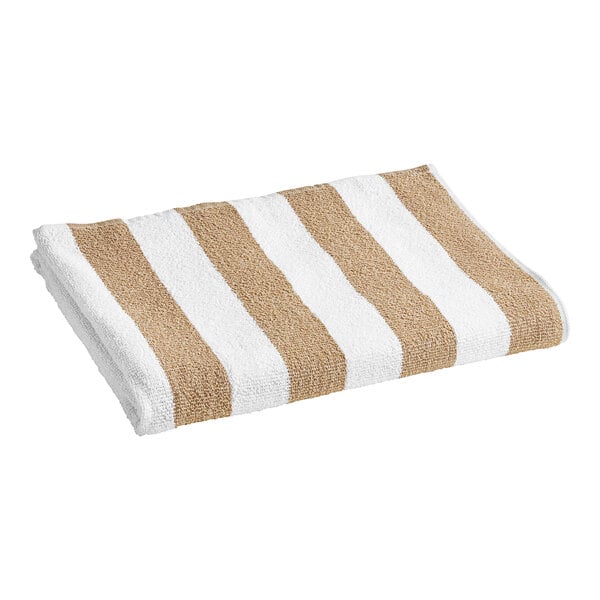 A brown and white striped Oxford Playa Cabana pool towel.
