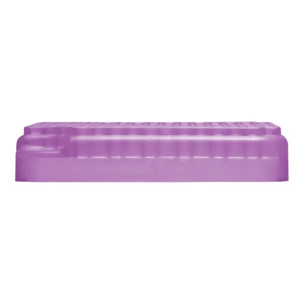 A purple rectangular air freshener refill with a textured surface.
