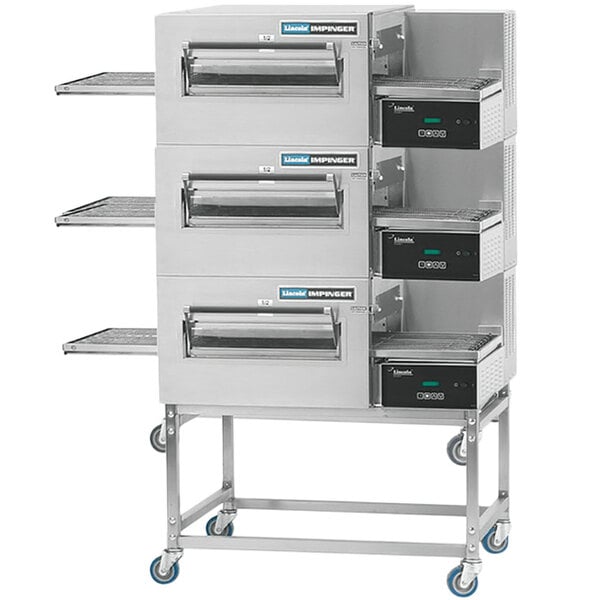 A triple stacked Lincoln Impinger conveyor oven.