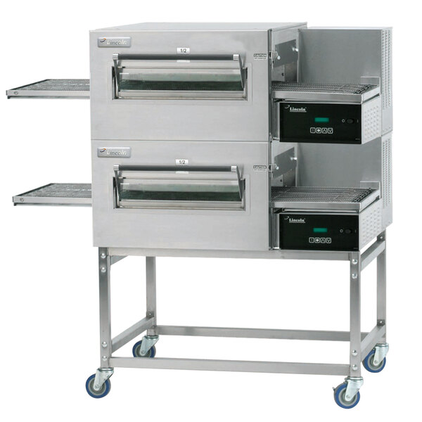 A large stainless steel Lincoln Impinger double stacked conveyor oven.