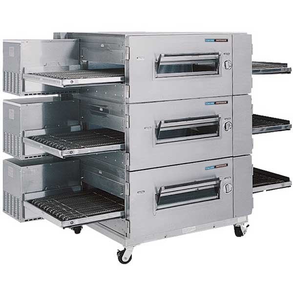 A Lincoln Impinger conveyor oven with trays inside.