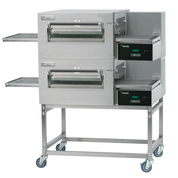 A double stacked Lincoln Impinger II electric conveyor oven with a stainless steel exterior.