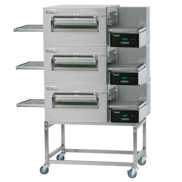 A Lincoln Impinger II triple stacked conveyor oven with three shelves.