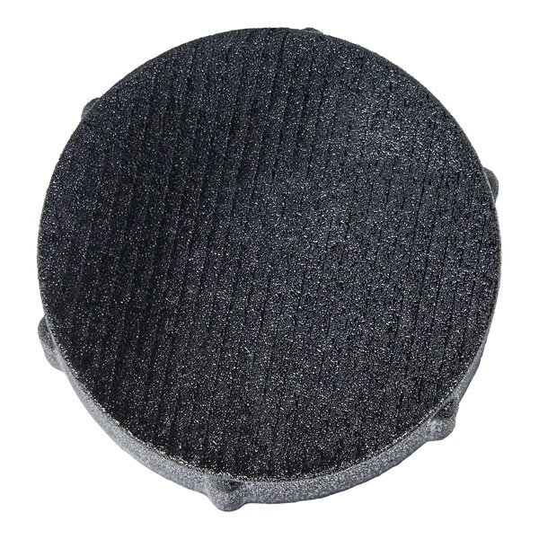 A black round Portacool drain cap with a textured surface.