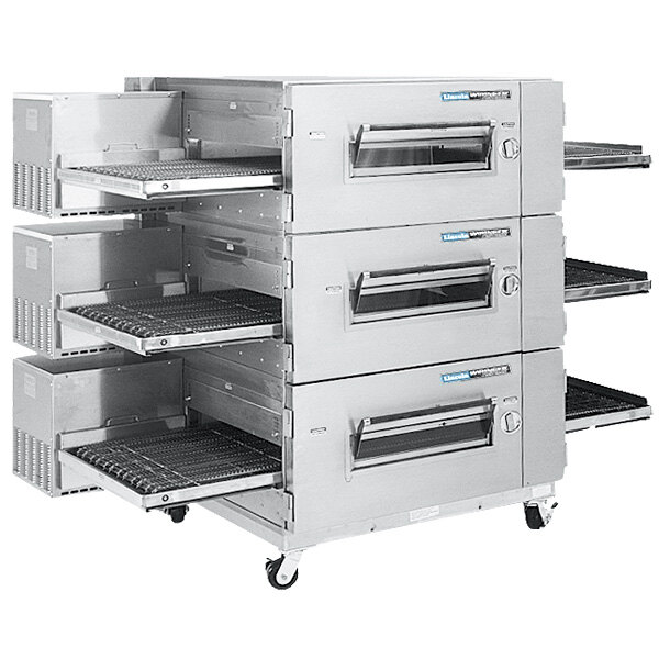 A low-profile Lincoln Impinger conveyor oven with three stacked ovens.