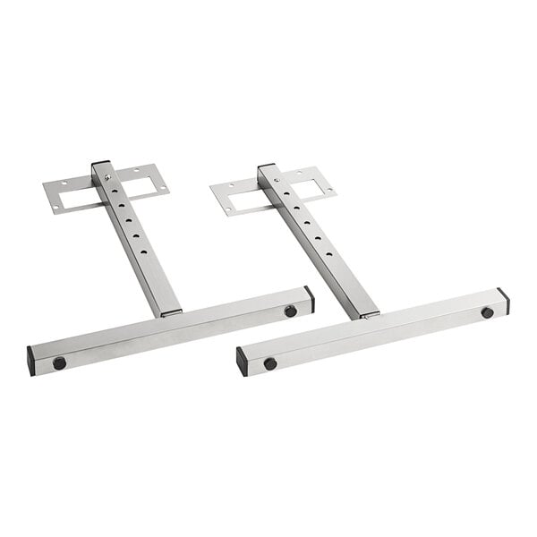 A pair of stainless steel T-style legs with two holes in each.