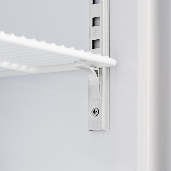 A white Avantco countertop display freezer with a metal shelf.