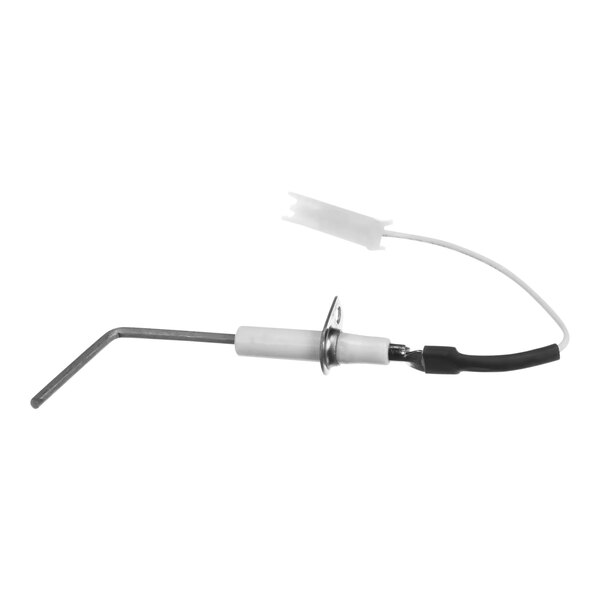A white and black wire connected to a Carrier flame sensor.