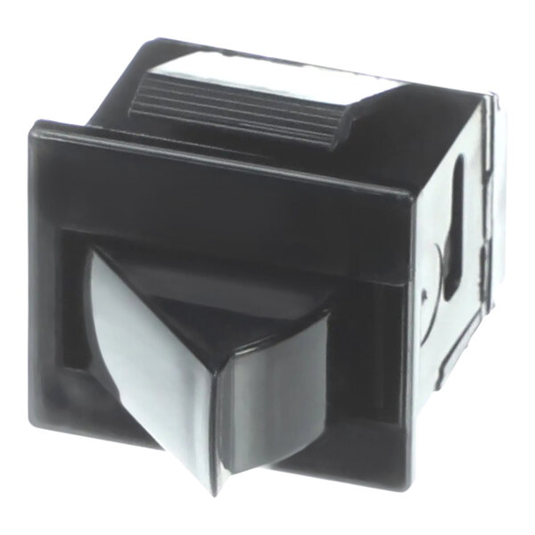 A close-up of a black Carrier blower door safety switch with a white button.
