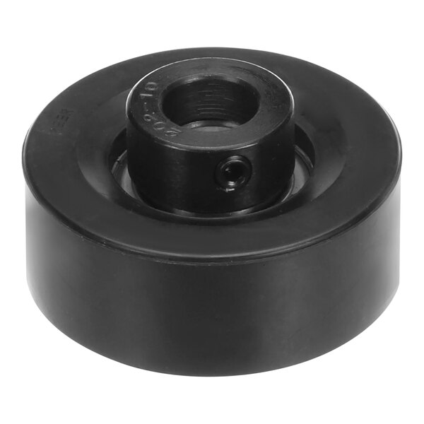 A black round plastic Carrier bearing with an open hole.