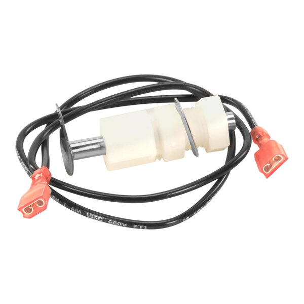 A white and black wire with an orange connector attached to a white plastic block.