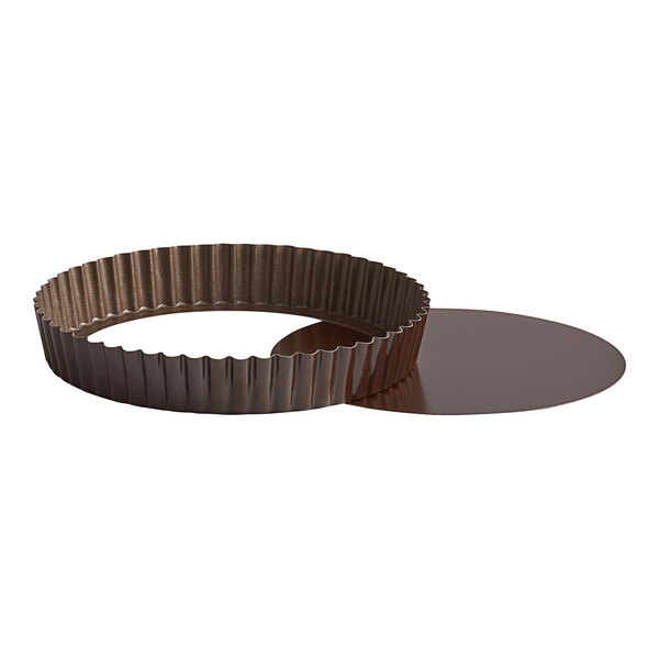 A round metal Gobel tart pan with a removable bottom.