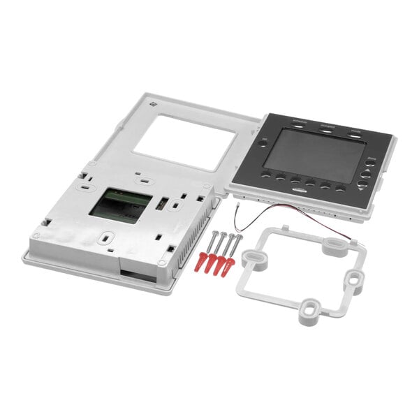 A white Carrier Edge Pro two stage programmable thermostat with screws and a screen.