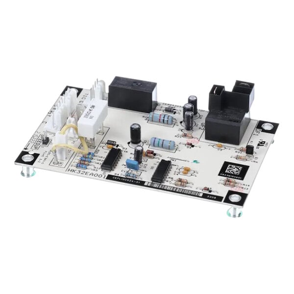 A black rectangular Carrier low voltage circuit board with white components.