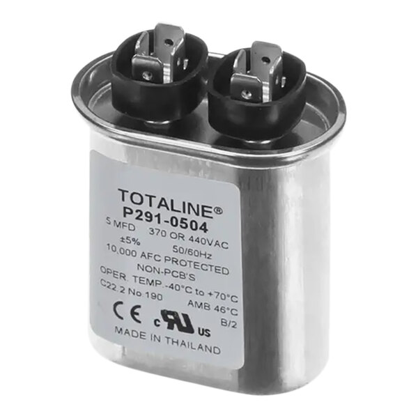 A silver Carrier P291-0504 capacitor with black and white label.