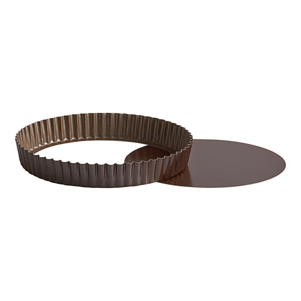 A round metal Gobel quiche and tart pan with a removable bottom.