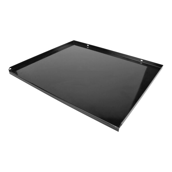 A black rectangular porcelain oven bottom with holes.