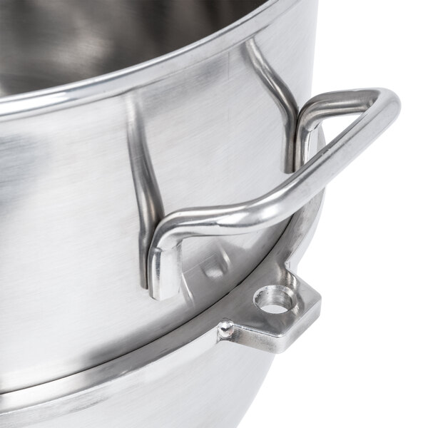 A stainless steel Vollrath bowl with handles.