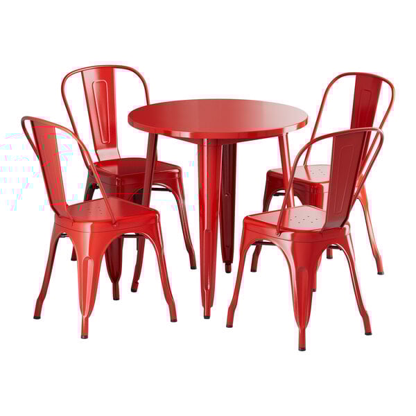 A Lancaster Table & Seating ruby red metal table with four chairs.