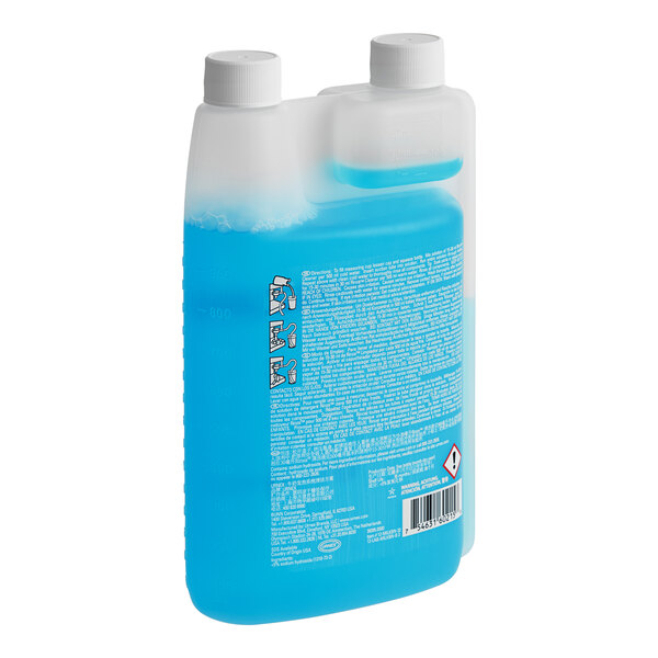 A blue plastic container of Milk Rinza cleaner.