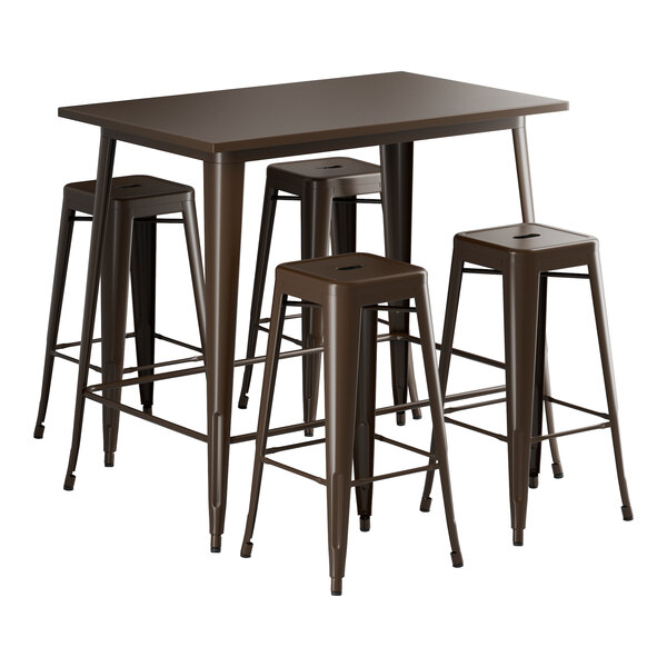 A brown metal Lancaster Table & Seating bar height table with four stools.