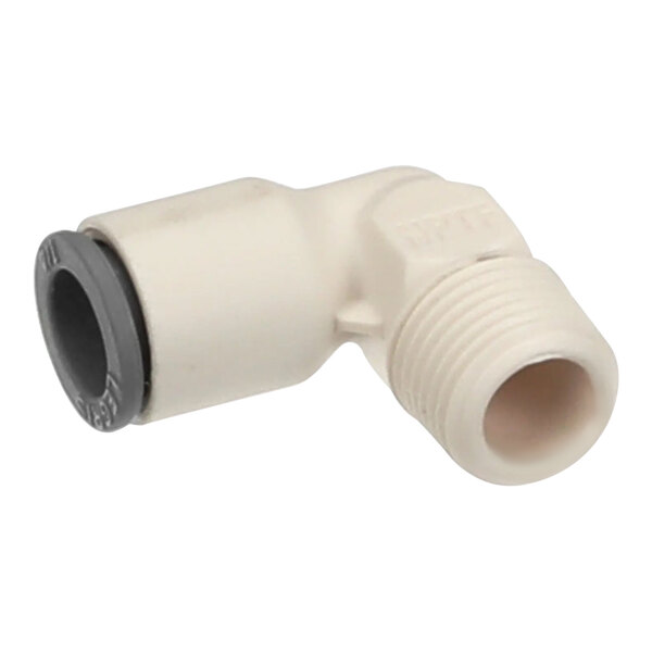 A white plastic pipe fitting with a grey nozzle on the end.