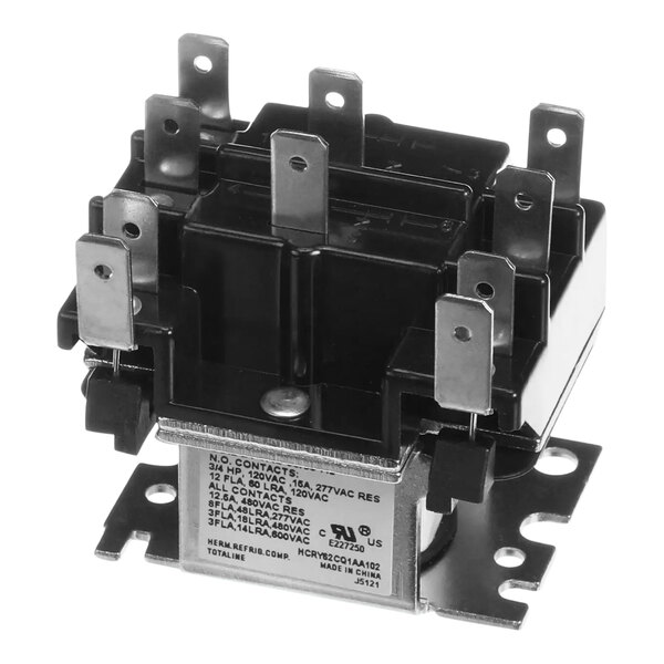 A close-up of a black and silver Carrier 24V coil fan relay with two switches.