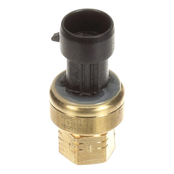 A close-up of a brass Carrier transducer with a black cap.