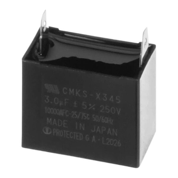 A black rectangular Carrier Capacitor with metal ends.