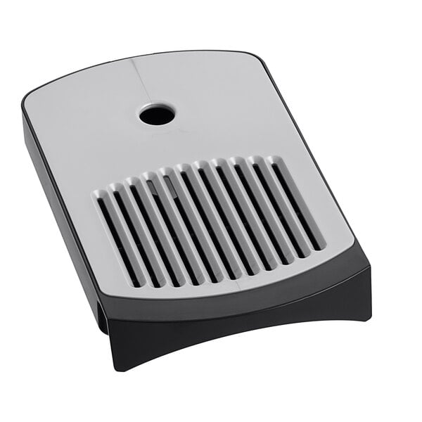 A grey and black rectangular drip tray with a grill.
