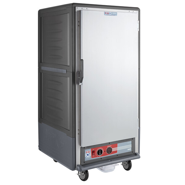 A large grey Metro C5 heated holding cabinet with a solid door.