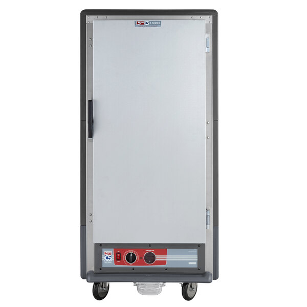 A large grey Metro C5 heated holding cabinet with a solid door.
