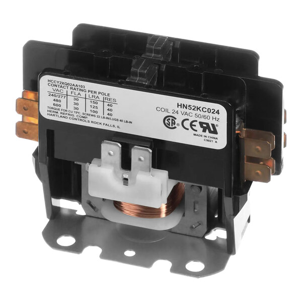 A Carrier HN52KC024 contactor with black and white electrical devices and copper wires.