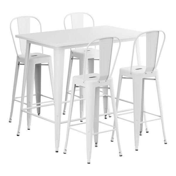 A Lancaster Table & Seating pearl white rectangular bar height table with white chairs.