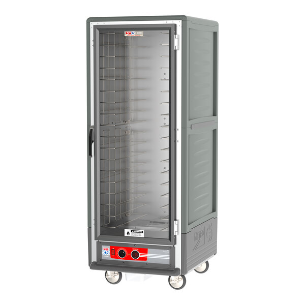 A gray Metro C5 heated holding cabinet on wheels.
