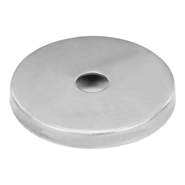 A white circular stainless steel disc with a hole in the center.