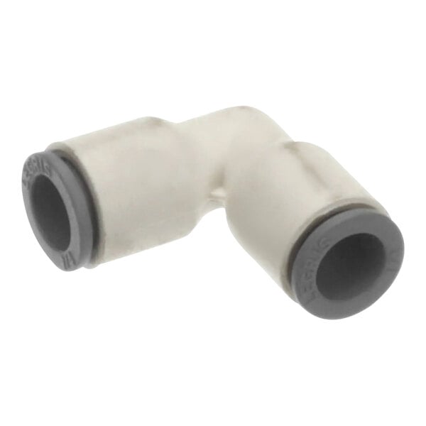 A white plastic elbow pipe with two grey ends.