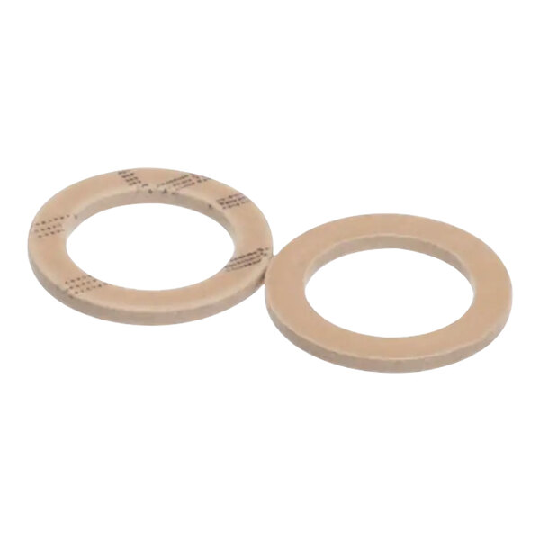 A close-up of a couple of beige rubber rings.