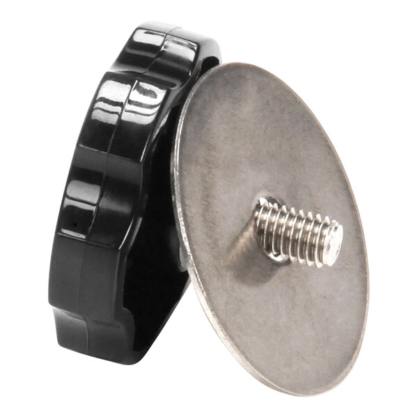 A close-up of a black screw and a black knob with a screw.