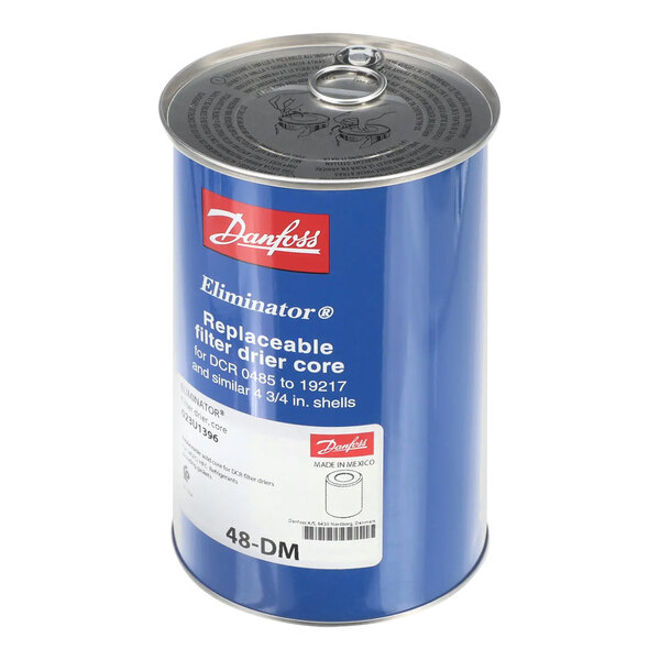A blue Carrier filter drier can with a white label.