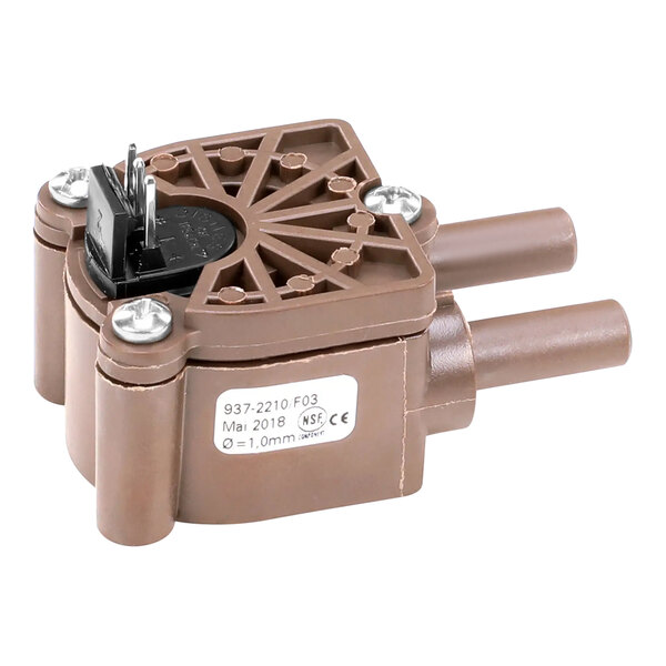 A brown plastic Bunn flow meter with a small black plug.