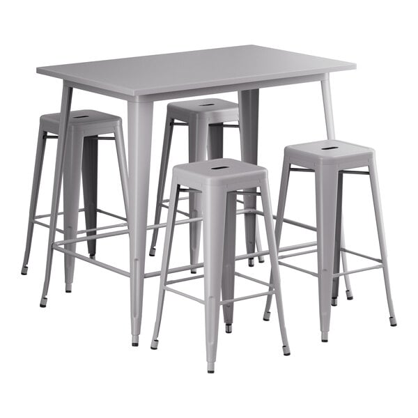 A Lancaster Table & Seating nickel gray metal bar height table with 4 backless barstools.