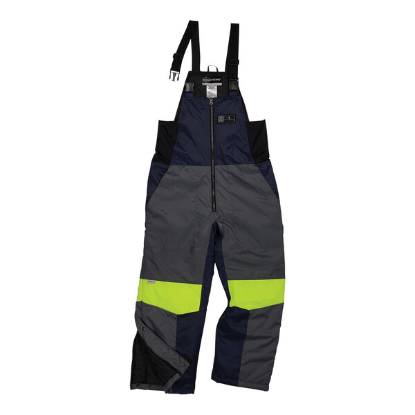 Ergodyne N-Ferno insulated bib overalls in navy and hi-vis yellow with reflective accents.