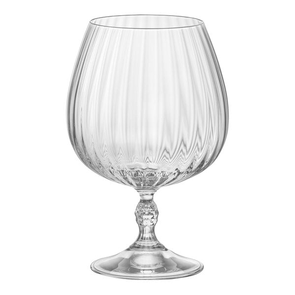 A Bormioli Rocco America Cognac glass with a stem and rippled design.