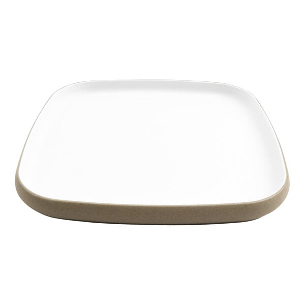 A white square cheforward melamine plate with a tan border.