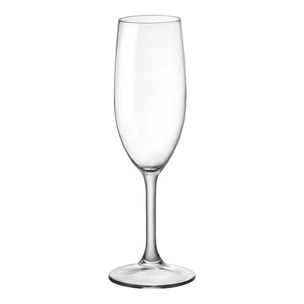 A clear wine glass with a long stem.