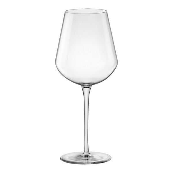 A clear wine glass with a long stem.