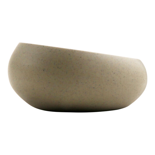 A white cheforward ramekin with a small hole in it.